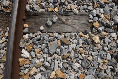 High angle view of stones on railroad track