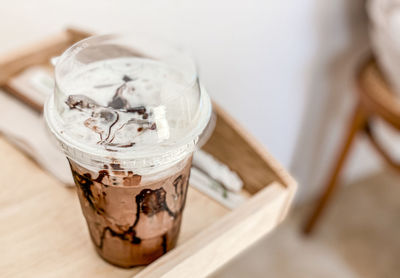 High angle view of drink in glass on table