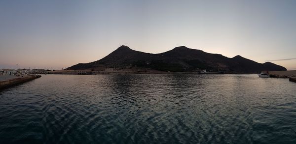 Scenic view of sea against clear sky during sunset