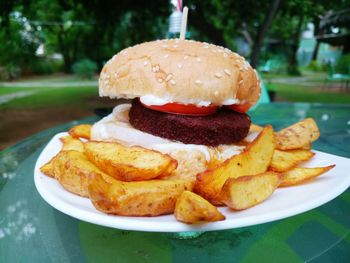 Close-up of burger in plate on table