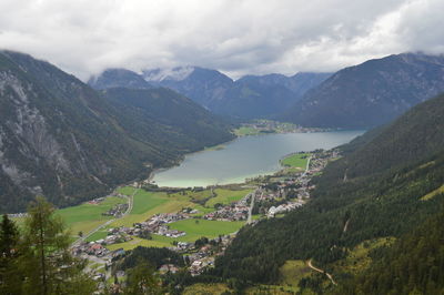 Scenic view of landscape and mountains against sky