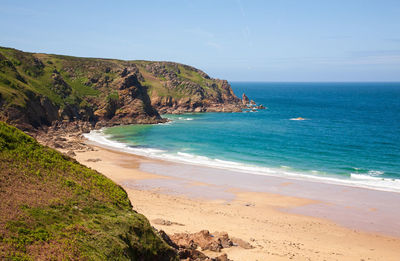 Cliffs and beach of the island of jersey in the english channel