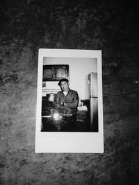 Close-up of reflection of man in mirror