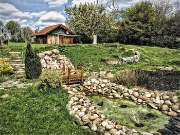 Stone wall with trees in background