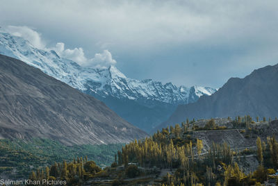 Scenic view of snowcapped mountains against sky