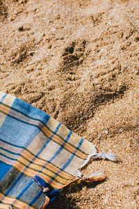 High angle view of towel at beach