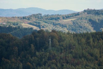 High angle view of trees and mountains against sky