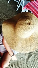 High angle view of woman wearing hat