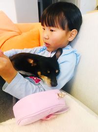 Boy with dog at home