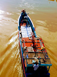 High angle view of people on boat in lake