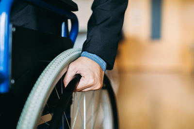 Close-up of man holding hands