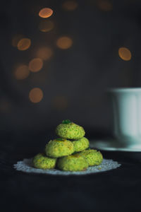 Close-up of green candies on table