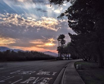 Empty road at sunset