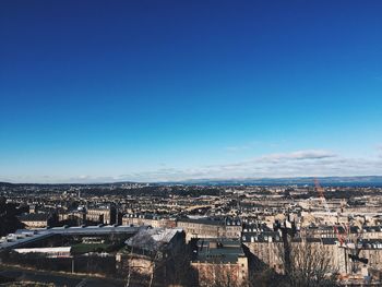 Cityscape against blue sky