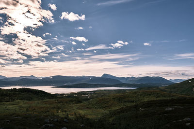 Scenic view of landscape against sky during sunset