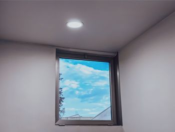 Low angle view of skylight in building