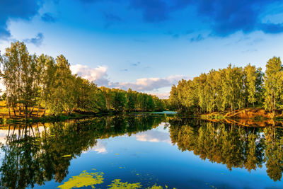 Scenic view of lake against sky during autumn