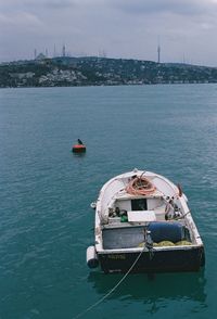 High angle view of boat in sea against sky