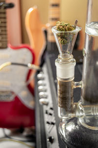 Close-up of wineglass on table