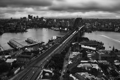 High angle view of cityscape against cloudy sky