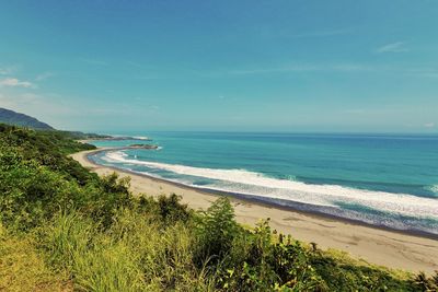 Scenic view of beach against sky