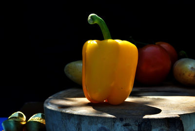 Close-up of yellow bell peppers on table