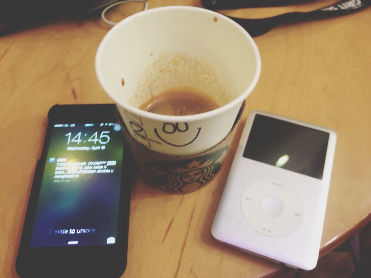 indoors, drink, communication, coffee cup, food and drink, table, text, refreshment, still life, western script, coffee - drink, close-up, coffee, freshness, cup, technology, high angle view, wireless technology, no people, number