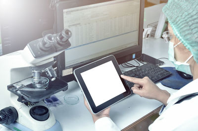 Man using laptop on table