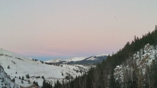 Scenic view of snow covered mountains