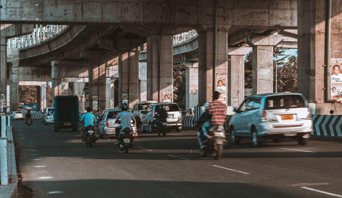 Cars on road in city