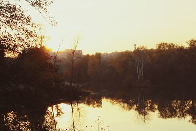 Scenic view of lake against sky during sunset