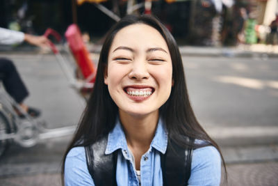 Portrait of smiling young woman