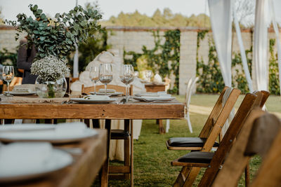 Empty chairs and tables at party