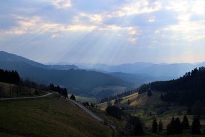 Scenic view of landscape against sky during sunset