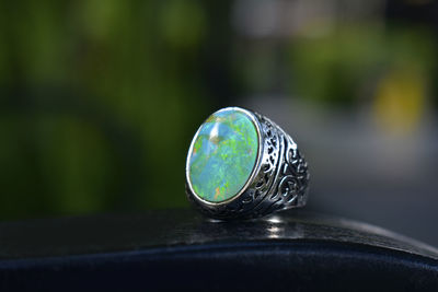 Opal is a silver ring decorated with an opal.