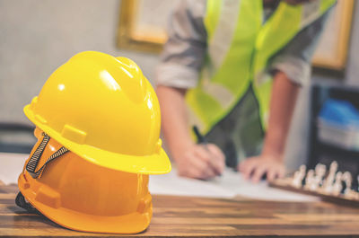 Close-up of hardhats at construction site