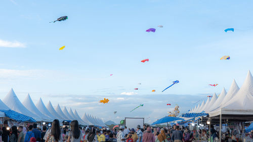 Low angle view of people on beach