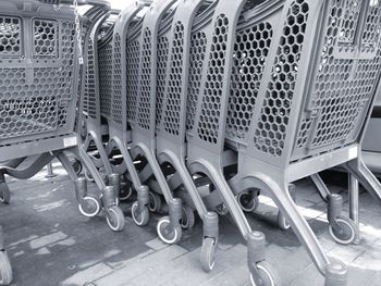 Shopping carts arranged on walkway