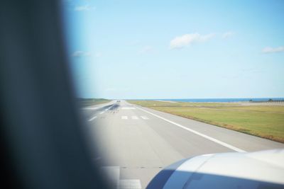 Road seen through airplane window