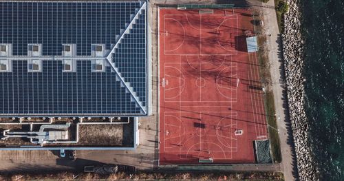 Aerial view of basketball court by building