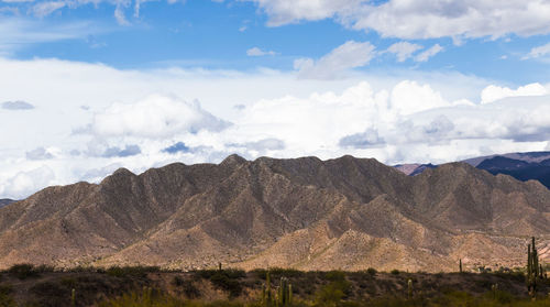 Scenic view of rocky mountains against sky