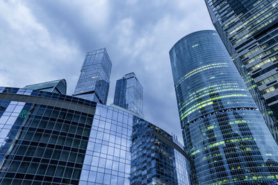 Low angle view of modern buildings against sky