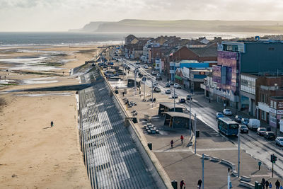 High angle view of people walking on beach