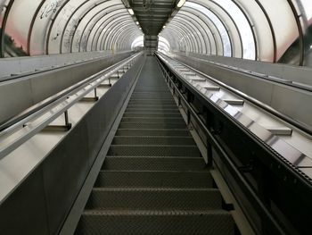 Low angle view of empty escalator at subway station