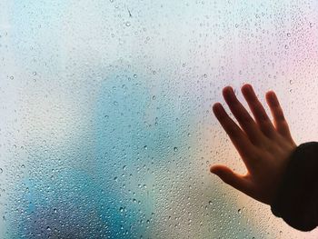Cropped image of person standing against white background