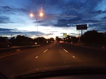 Cars on road at night