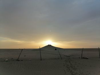 Scenic view of beach during sunset