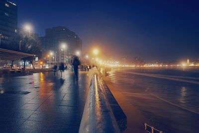 Illuminated street light at night