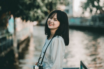 Portrait of smiling young woman