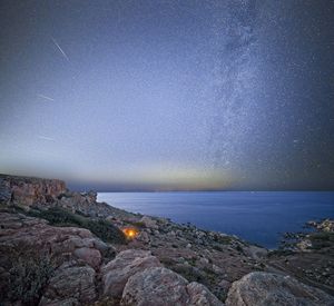 The milky way and meteors over the mediterranean coast